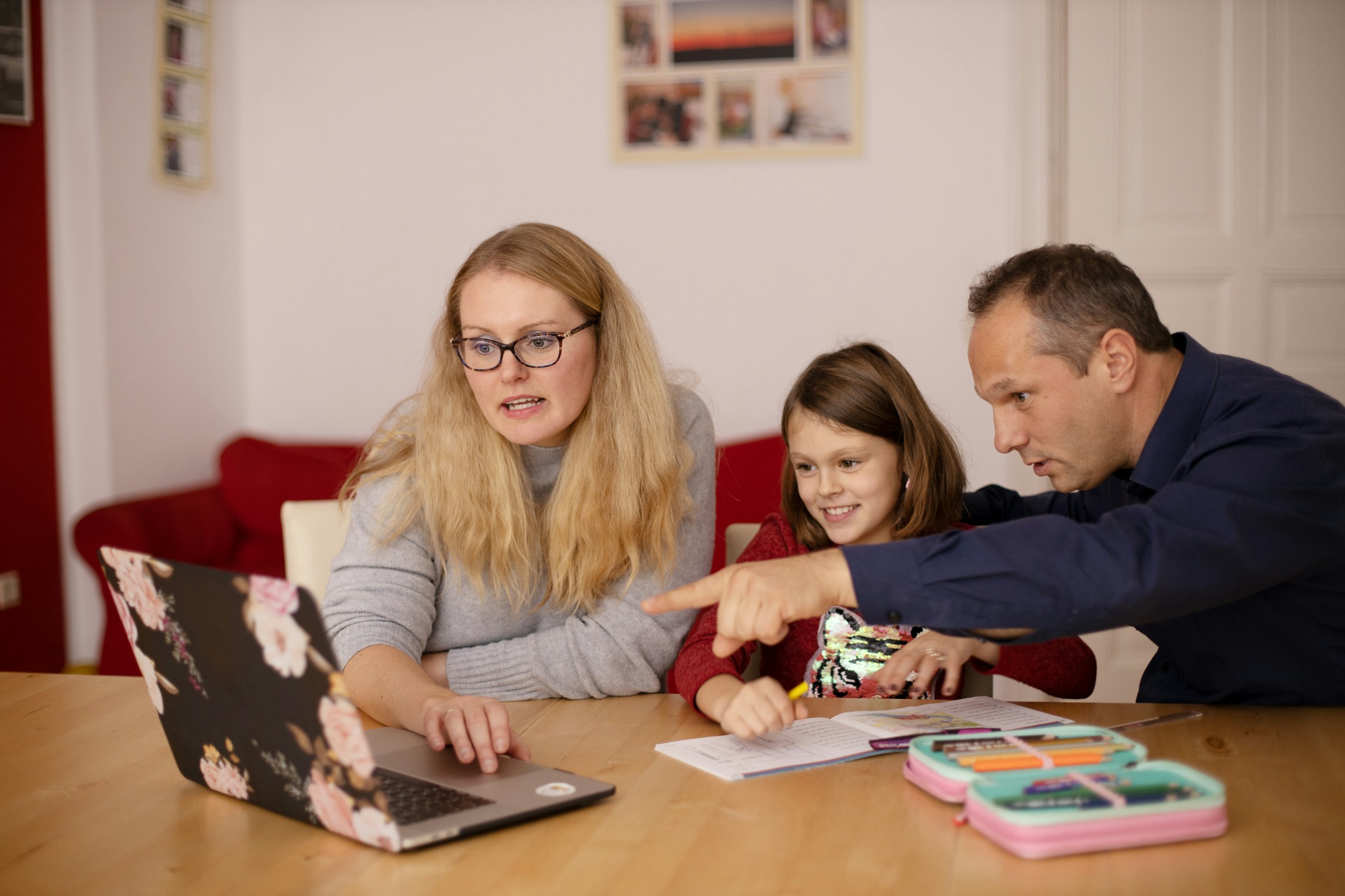 Family reviewing documents together at home
